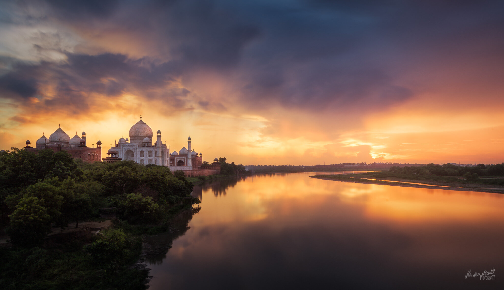 Sunrise view of the Taj Mahal from the Yamuna river